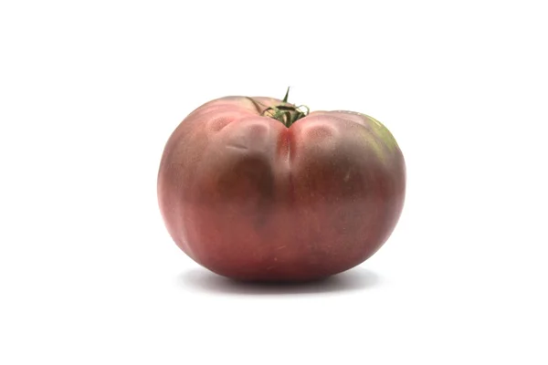 Closeup Tomate Orgânico Marrom Sobre Fundo Branco — Fotografia de Stock