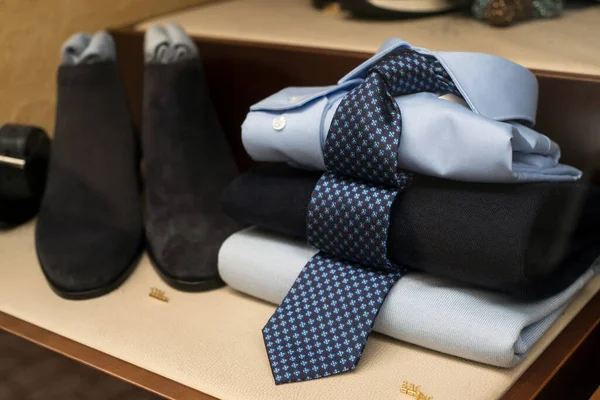 closeup of tie and men shirt in a fashion store showroom