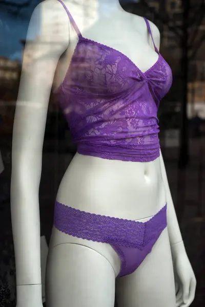 Closeup of purple underwear on mannequin in a fashion site showroom