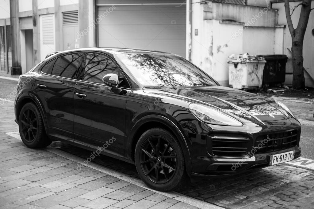Mulhouse - France - 14 January 2024 - Front view of black Porsche cayenne parked in the street