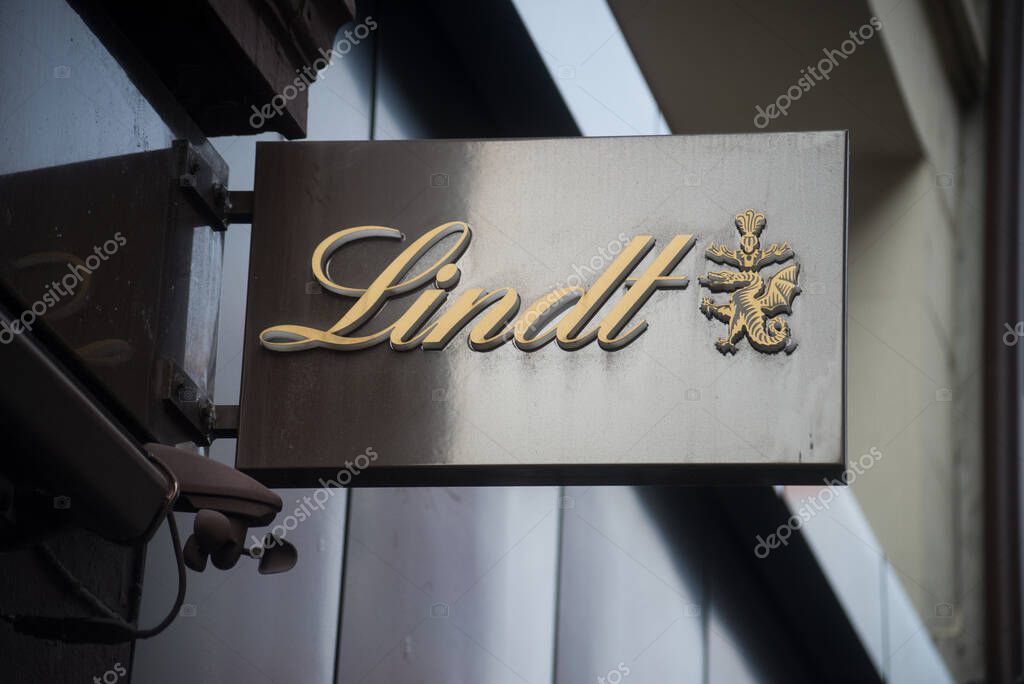 Basel - Switzerland - 21 February 2024 - Closeup of Lindt logo on store front in the stree