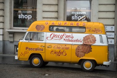 Brussels - Belgium - 3 March 2024 - Profile view of volkswagen food truck saling traditional belgian waffle clipart