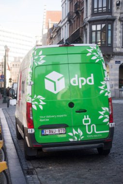 Brussels - Belgium - 30 February 2024 - rear view of DPD delivery truck parked in the street clipart