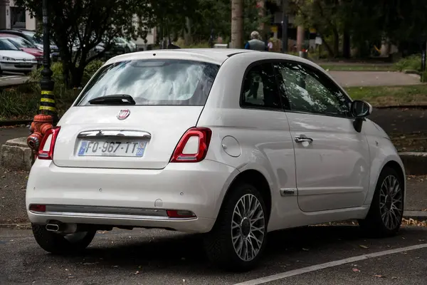 stock image Mulhouse - France - 4 september 2024 - rear view of white fiat 500 parked in the street