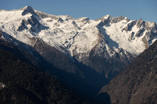 stock image Pinzolo in winter sunny day. Val Rendena dolomites  Italian alps, Trentino Italy.