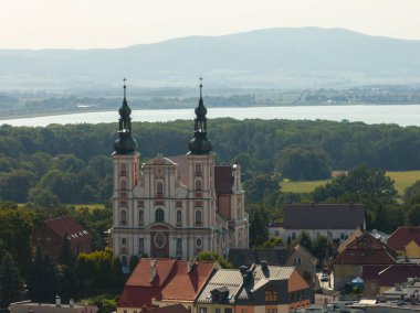 Otmuchow town in summer. Otmuchow panorama from drone aerial fly.Aerial drone view of castle and Church in Otmochow a town in Nysa County, Opole Voivodeship, Poland. 	