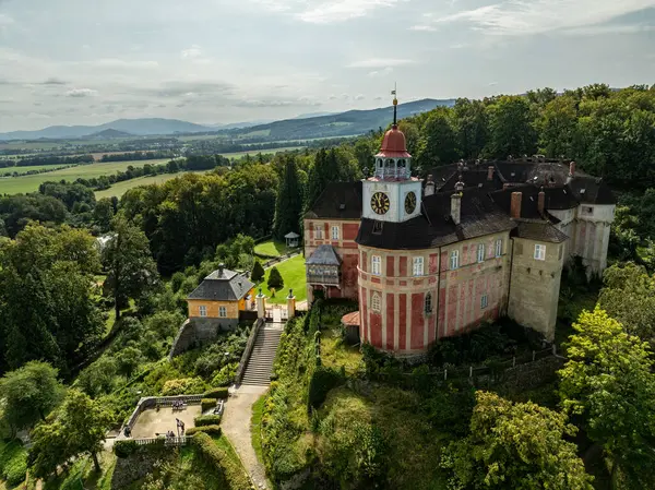 stock image Jansky Vrch State Chateau on a rocky hill above the town of Javornik, located in the Czech Republic in Moravia. Javornik in summer drone fly.Aerial drone view of Castle Jansky Vrch in Javornik.