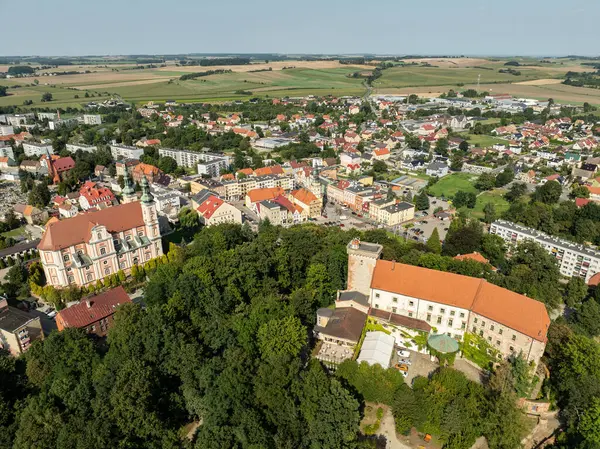 Otmuchow town in summer. Otmuchow panorama from drone aerial fly.Aerial drone view of castle and Church in Otmochow a town in Nysa County, Opole Voivodeship, Poland. 	