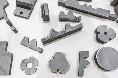 Finished steel products after quenching. Steel after quenching. Various steel parts quenched. Surface quenched. Surface hardening of steel. clipart