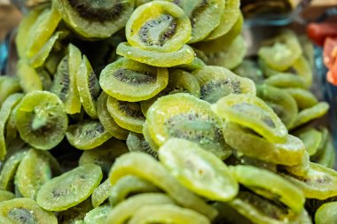 Dried colorful tropical fruits. Sweet fruits in dried form. Close up shot of dried sweet tropical fruits clipart