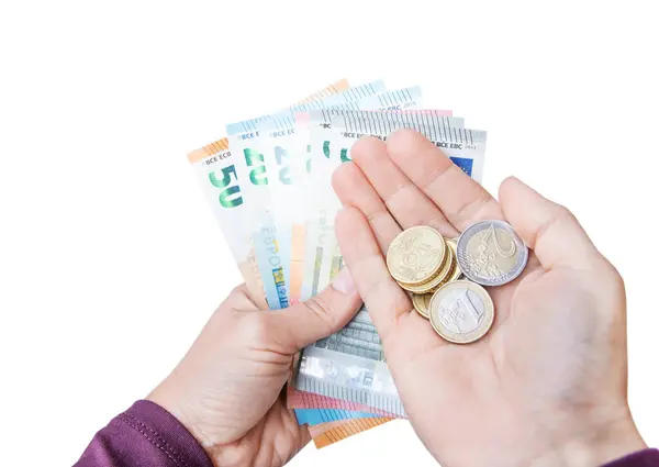 Avro banknotları ve bozuk paralar tutan izole kadın elleri. Nakit, bütçe. Tasarruf, gelir dağılımı, ödemeler, yatırımlar kavramı.