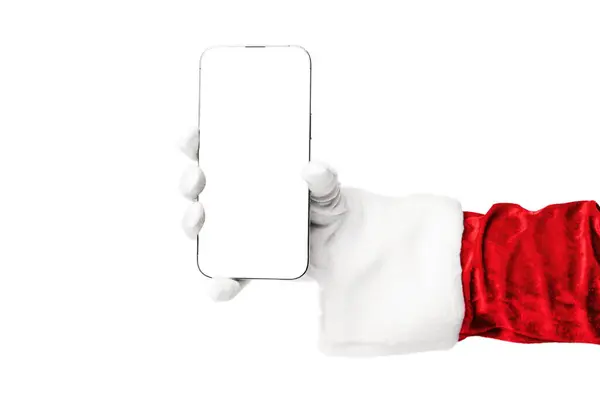 Noel Baba kıyafetli biri beyaz perdeli bir telefonu beyaz arka planda tutuyor. Boşluğu kopyala.