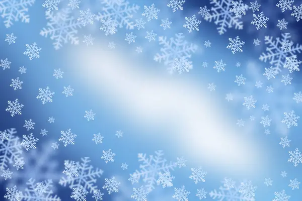Kar taneleri ile Noel mavisi arka plan. Kışın büyülü atmosferi. Boşluğu kopyala.