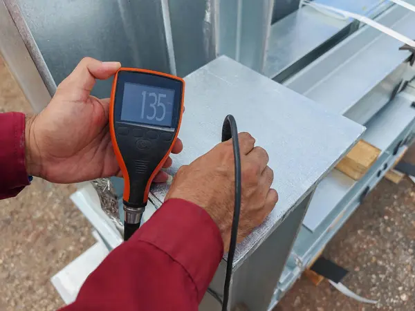 Measure the Coating Thickness Galvanized with a Coating Thickness Gauge by Specification of Project for Steel Structure Work at Industrial Factories.