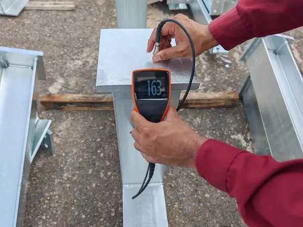 Measure the Coating Thickness Galvanized with a Coating Thickness Gauge by Specification of Project for Steel Structure Work at Industrial Factories.