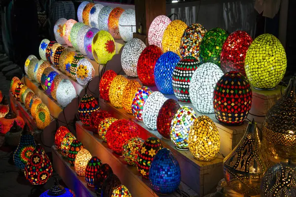 Egyptian mosaic egg shaped lamps. Arabian egg-shaped unique lamps in stock souvenir shop. Traditional Egyptian souvenirs at the street market.