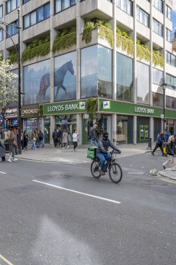 London, UK - March 23, 2024 : Lloyds bank branch in London. Lloyds Bank plc is a British retail and commercial bank with branches in England and Wales. clipart