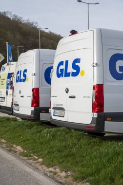 Budca, Slovakia - March, 30, 2024 :  GLS (General Logistics Systems B.V) parcel services delivery vans at the GLS depot in Budca. Slovakia. clipart