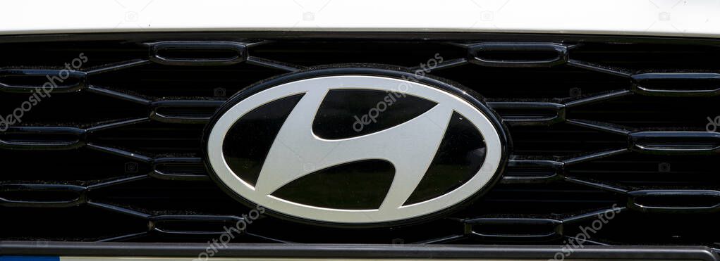Nova Bana, Slovakia - June, 1, 2025 : Hyundai emblem on the car hood. Hyundai logo close up.