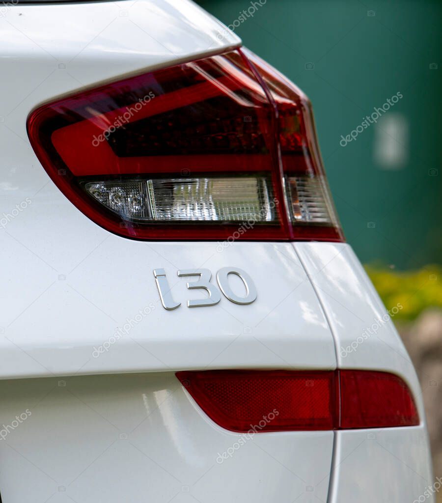 Nova Bana, Slovakia - June, 1, 2025 : Hyundai i30 emblem and rear lights on the car. Hyundai logo close up.