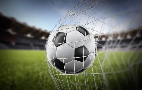 Soccer ball or football in the net. Football goal. 3D illustration.