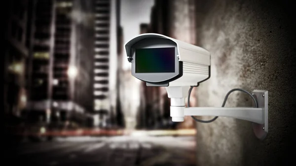 Security camera hanging on the wall against city background. 3D illustration.