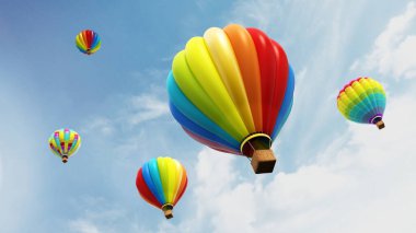 Havada yükselen renkli sıcak hava balonları