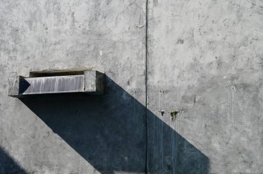 faucet of pool on cement wall background