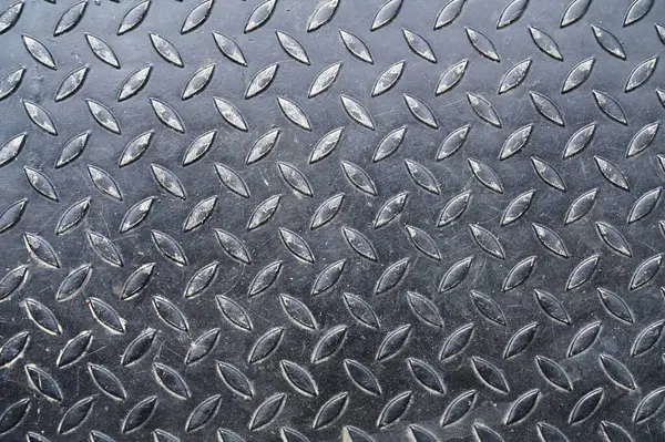 黒い金属床のテクスチャの背景建設業界 — ストック写真
