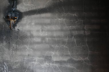 power plug electricty burn on brick wall texture background