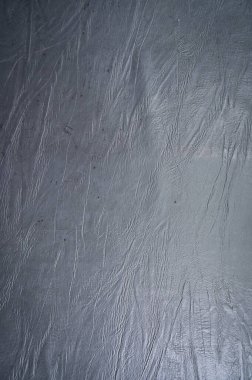 old dark blue leather texture background, closeup furniture
