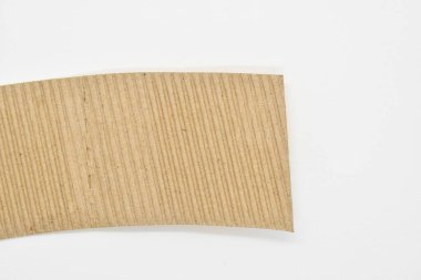 closeup brown paper cardboard texture on white background