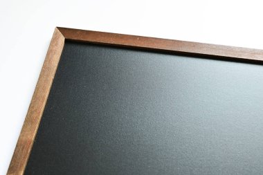 blank clean new chalkboard in wooden frame isolated on white background, blackboard for education school