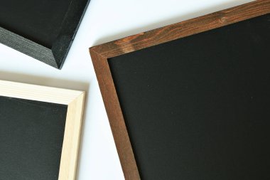 blank clean new chalkboard in wooden frame isolated on white background, blackboard for education school