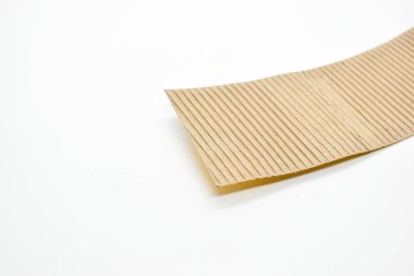 closeup brown paper cardboard texture on white background