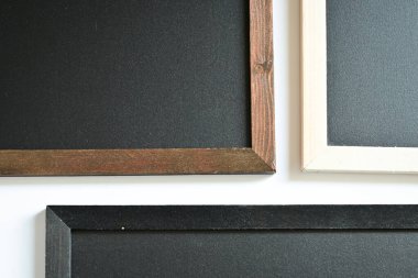 blank clean new chalkboard in wooden frame isolated on white background, blackboard for education school