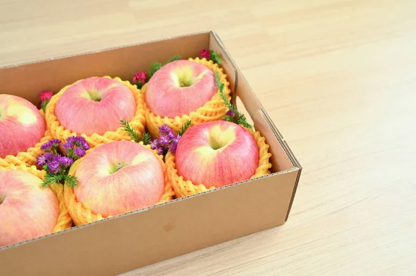 Beautiful Pink Apple Box Wood Floor Healthy Fruit — Zdjęcie stockowe