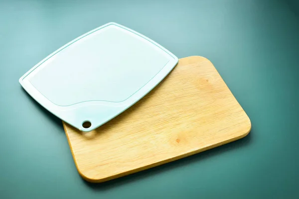 Blue Brown Wooden Cutting Board Green Background Equipment Cooking Kitchen — Stock Photo, Image