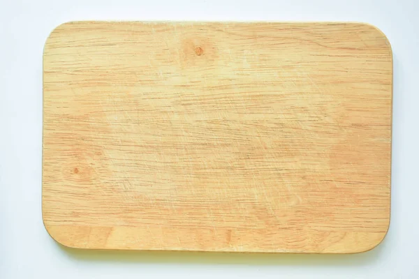 brown wooden cutting board on white background, plank wood for cooking in the kitchen