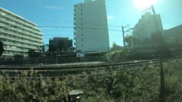 Viaje Tren Japón Mirando Vista Ciudad Través Escena Ventana — Vídeo de stock