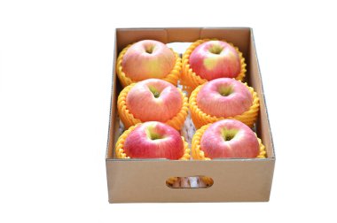 beautiful pink apple in the box on white background