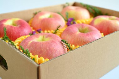 beautiful apple in the box on white background