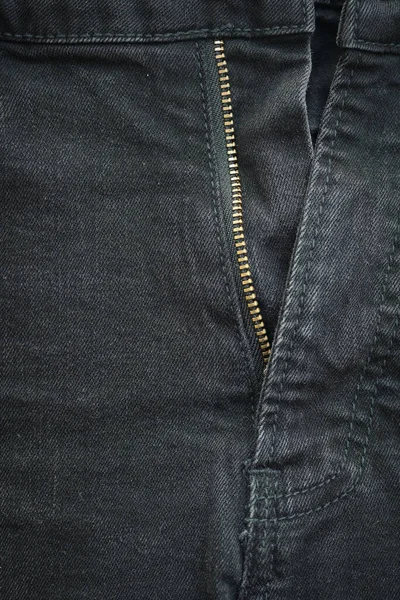 黑色斜纹棉布服装面料背景 裤子流行前与拉链 — 图库照片