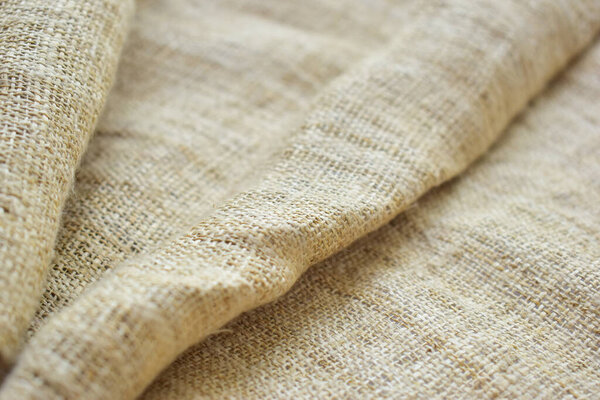 brown sackcloth texture background, crumpled burlap fabric textile for design