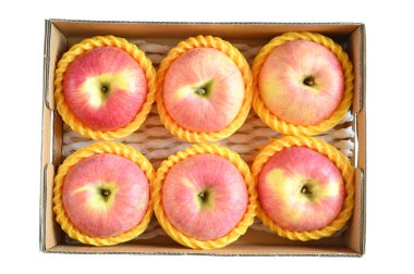 beautiful pink apple in the box on white background