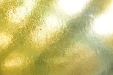 Tasarım için ışık ve gölge içeren bulanık altın dokuName