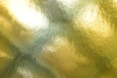 Tasarım için ışık ve gölge içeren bulanık altın dokuName