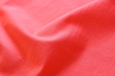 Kumaş kumaşın kırmızı dokusu, moda bezi tasarımı için soyut görüntü