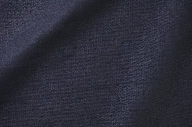 Kumaş tekstil endüstrisinin siyah pamuk dokusu, moda bezi tasarımı için soyut koyu görüntü