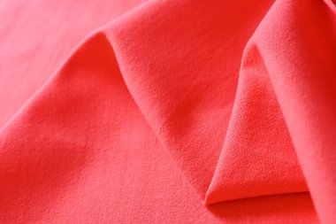 Kumaş kumaşın kırmızı dokusu, moda bezi tasarımı için soyut görüntü